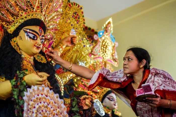 With love Goddess Durga is worshiped in Bengal as a daughter, a mother, a source of power. She is greeted with sweets and vermilion on the last day of Durga Puja festival.
